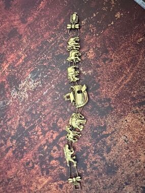 Vintage Animal Charm sliding Bracelet in Antiqued Gold Tone